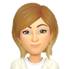 bitmoji of blond,short haired female with green eyes.
